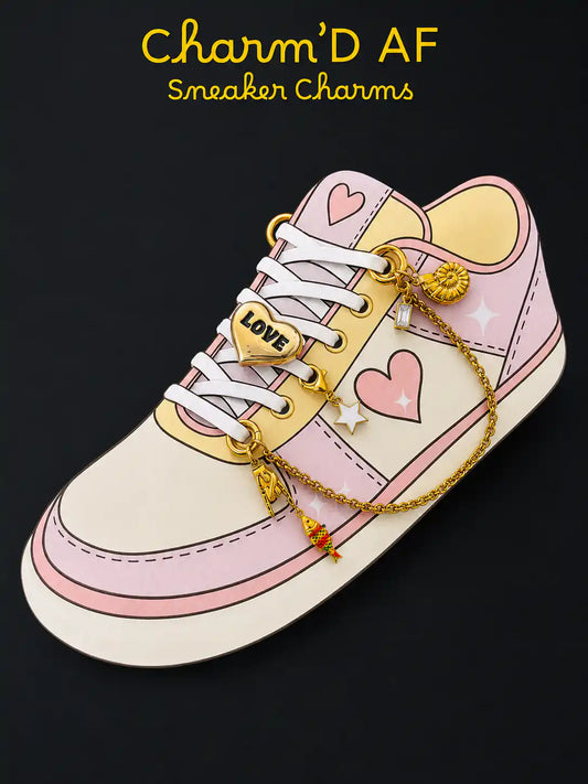 Illustration of the Charm'D AF Secret Crush Edit gold fish chain with LOVE heart, white star and crystal shoe charms on a pastel sneaker