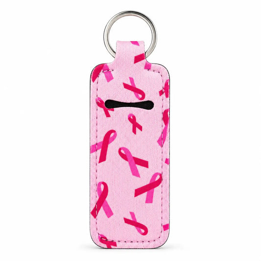 Pink Ribbon Lip Balm Holder with pink ribbon print, soft pink leatherette body and silver metal key ring