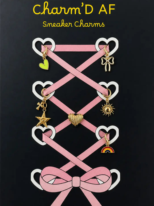 Charm'D AF Cloud Nine Edit gold shoe charm bundle showing green heart, crystal bow, sun, star, rainbow and striped heart charms