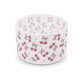 White water bottle boot featuring a repeating pink cherry and bow pattern with small sparkle accents, shown on a white background.