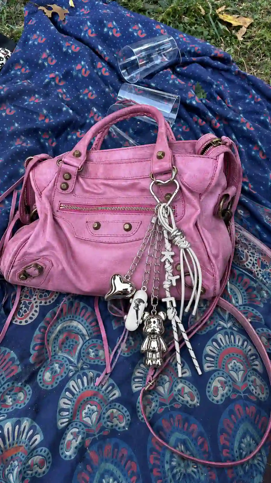 Chrome Crush Teddy Bag Charm styled on a pink handbag with silver teddy, heart and skateboard charms
