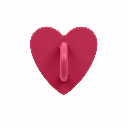 Hot pink heart-shaped stick-on charm hook on a white background