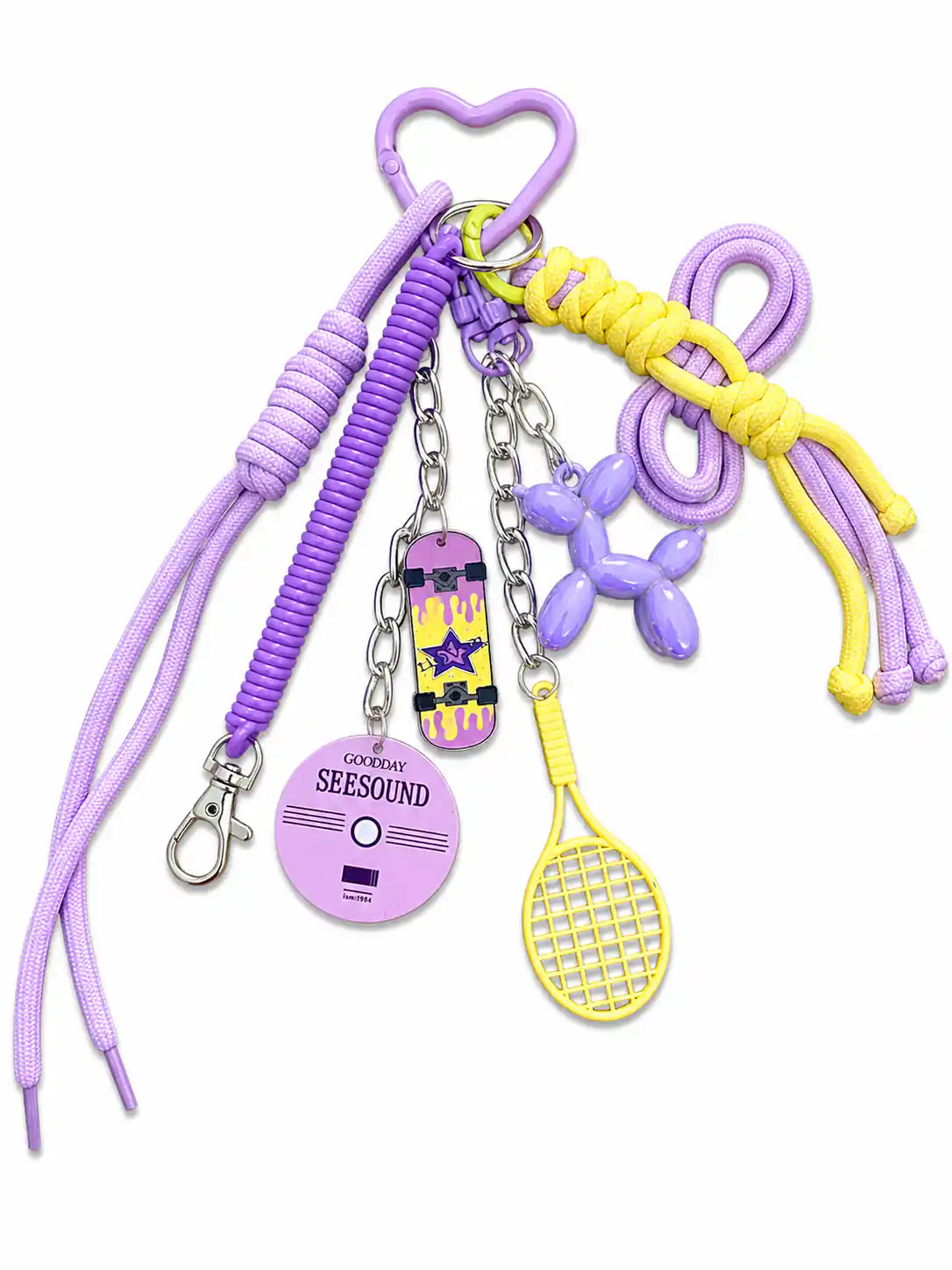 Lavender Rush Balloon Dog Bag Charm with lilac cords, purple balloon dog, skateboard, tennis racket and heart clip