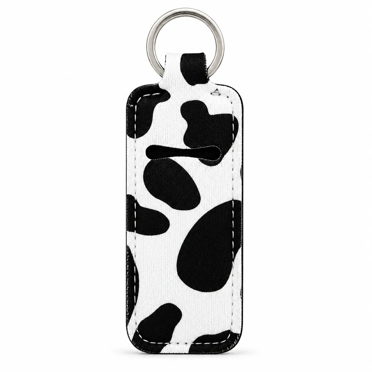 Midnight Moo Lip Balm Holder with black-and-white cow print, leatherette body and silver metal key ring