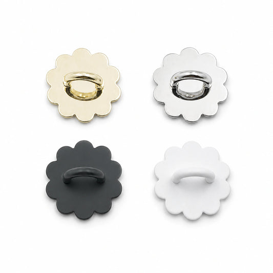 Four flower-shaped bottle hooks in gold, silver, black and white