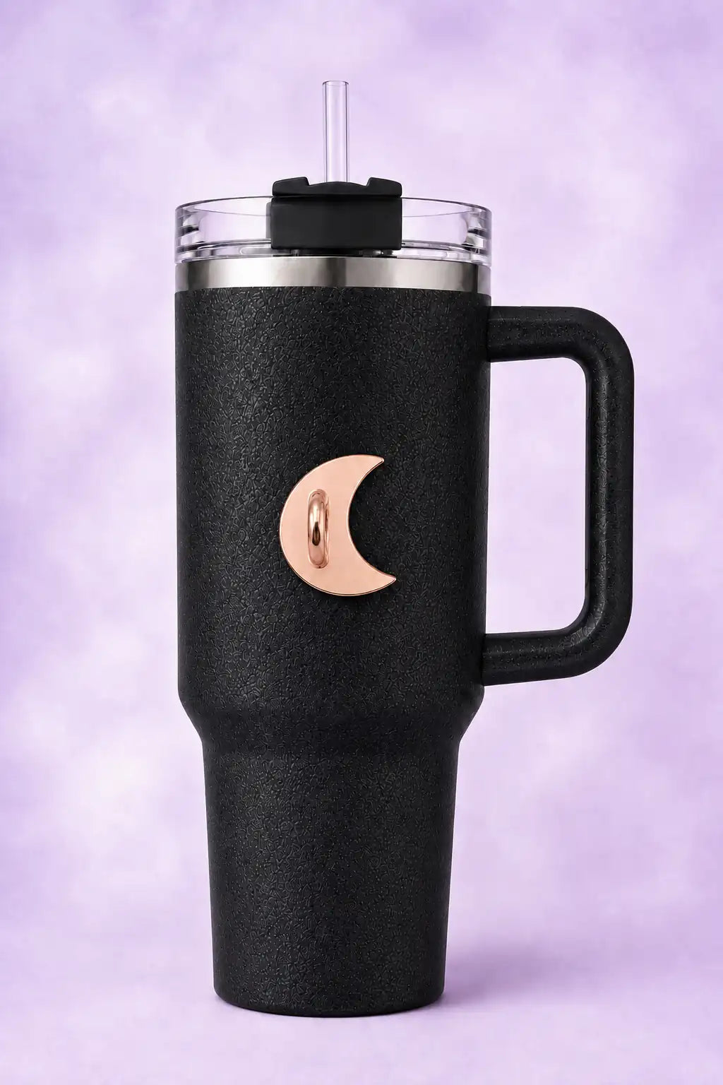 Black textured tumbler with a rose gold crescent moon bottle hook