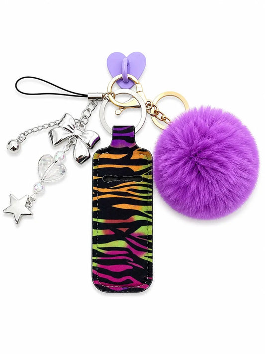IT Girl Wild Child Bundle with colourful animal-print bottle charm, fluffy purple pom pom, bow, butterfly and star charms