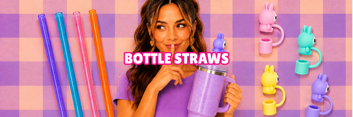 Charm'D AF colourful reusable bottle straws and playful straw toppers styled with a water bottle